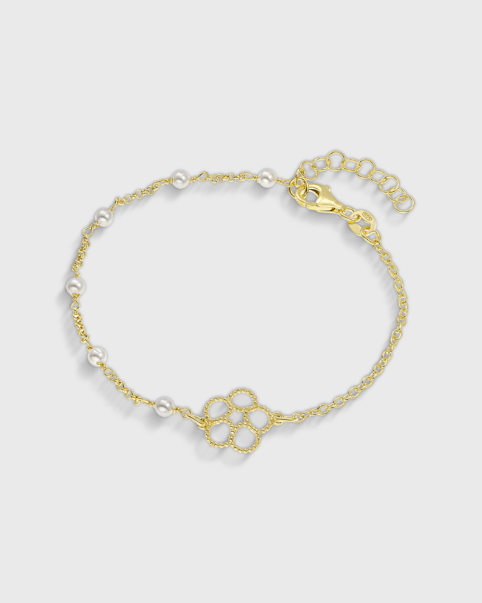 Vogue bracelet with white pearls and a central fllower-shaped motuf