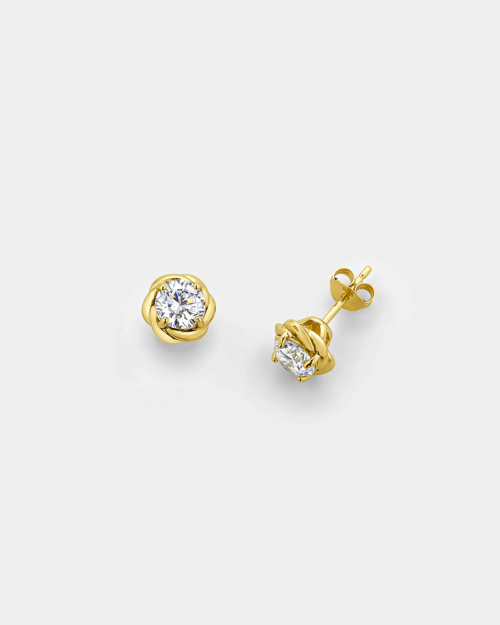 Stud earrings with white zircon in a rose-inspired setting