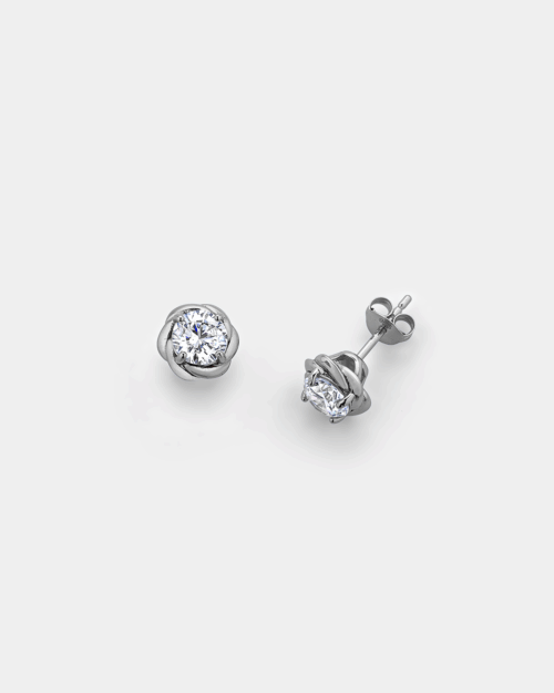 Stud earrings with white zircon in a rose-inspired setting
